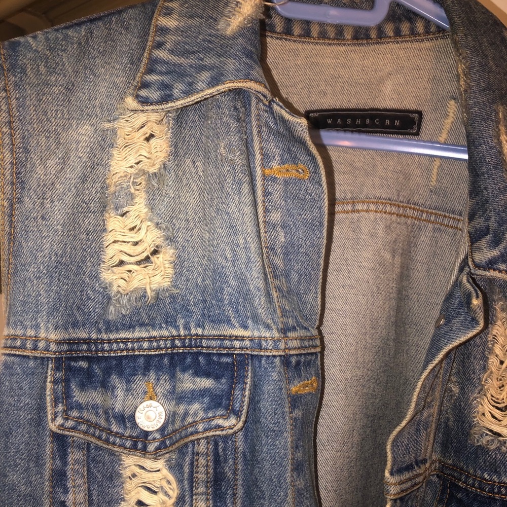 Distressed Denim vest from Urban Outfitters